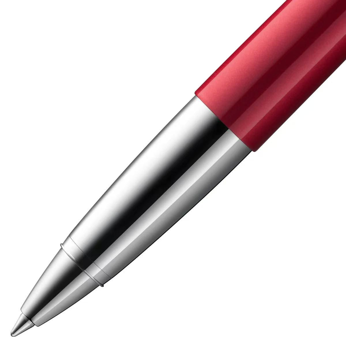close-up of lamy studio piano red rollerball pen