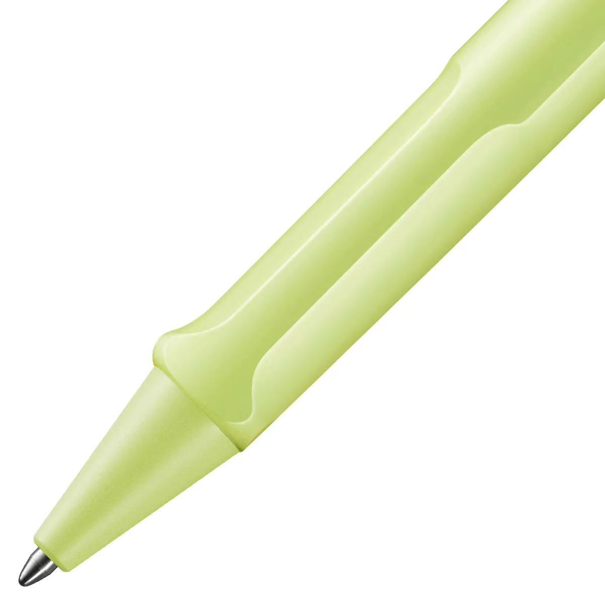 Close-up of a light green pen on a white background