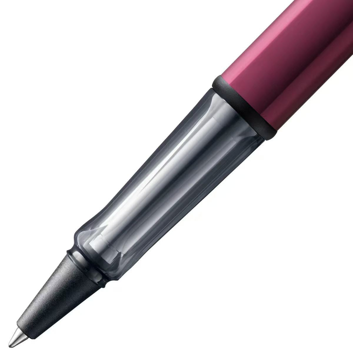 close-up of lamy al-star black purple rollerball pen